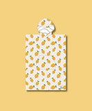 Découvrez notre poncho de plage adulte beige avec des motifs citrons jaunes. Le Isaure