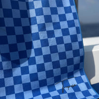Poncho de plage enfant damier bleu microfibre Tropesa