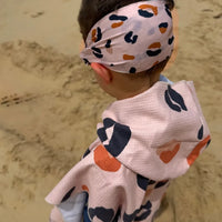 Poncho enfant et lunettes Colette