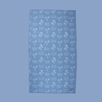Serviette de plage palmier et vague bleu Lou – Microfibre antisable