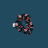 Gänseblümchen-Scrunchie aus Frottee