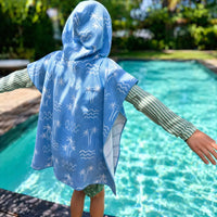 poncho enfant à capuche bleu motifs valgues et palmiers